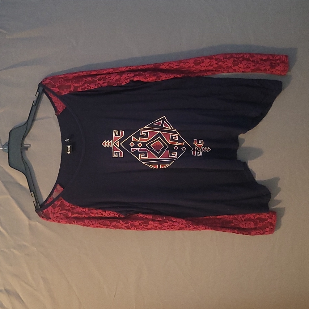 Cruel Womens Top with lace sleeves and tulisan back.